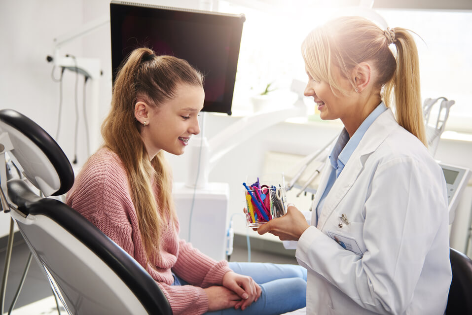 Girl picking braces color