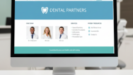 A laptop showing Dental Partners